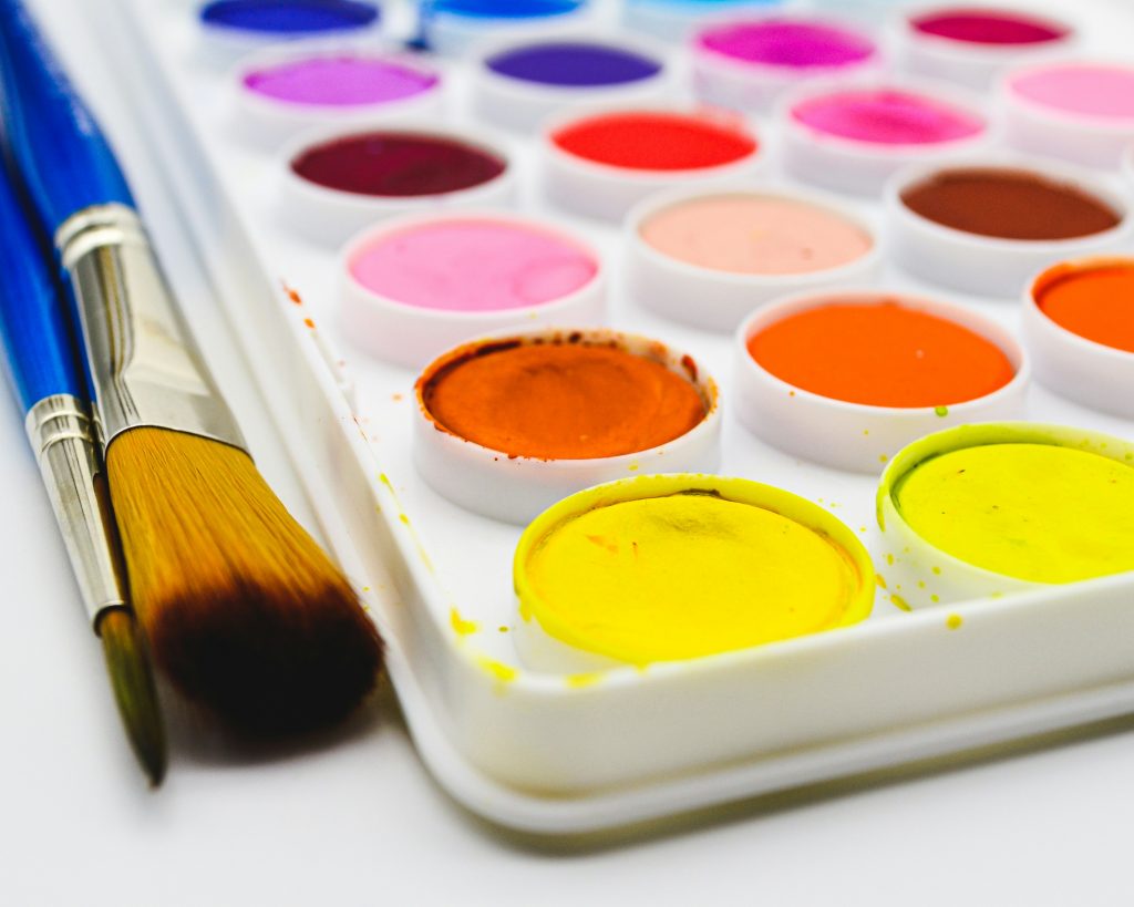 watercolor paint set with paint brushes
