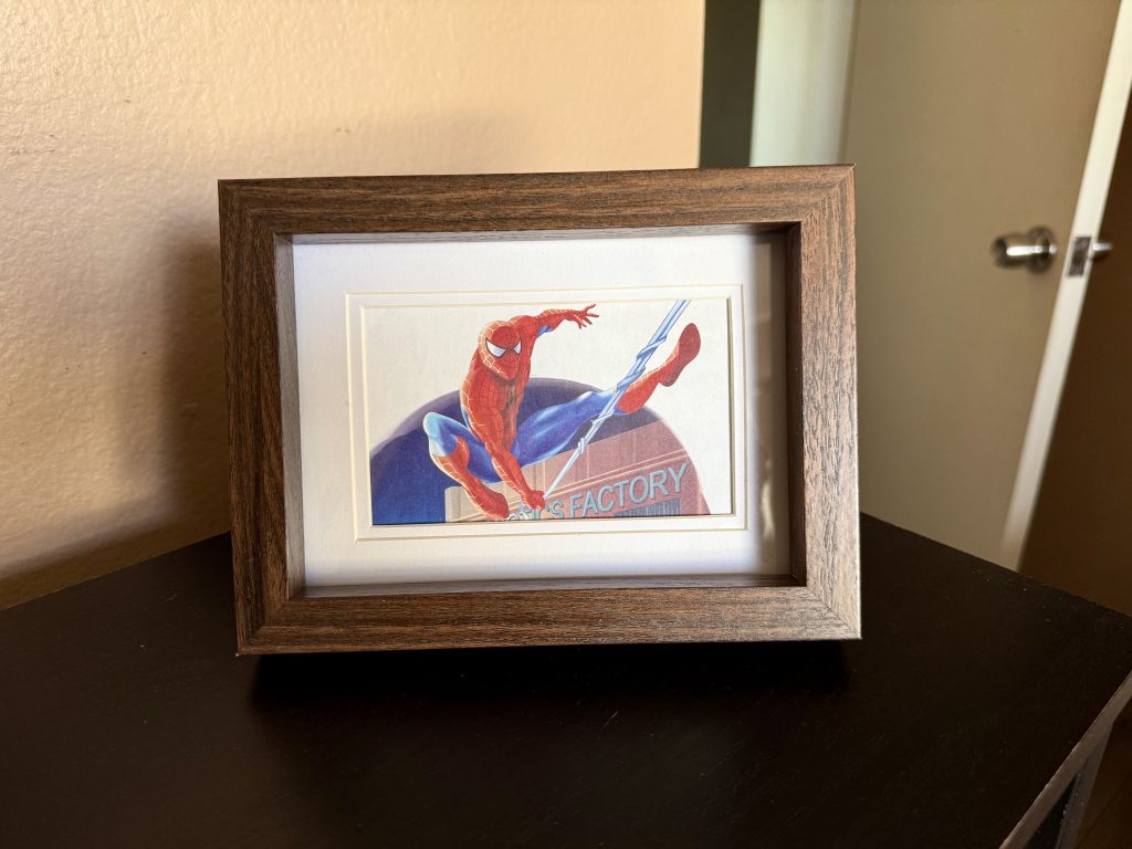 spiderman image in a wooden frame