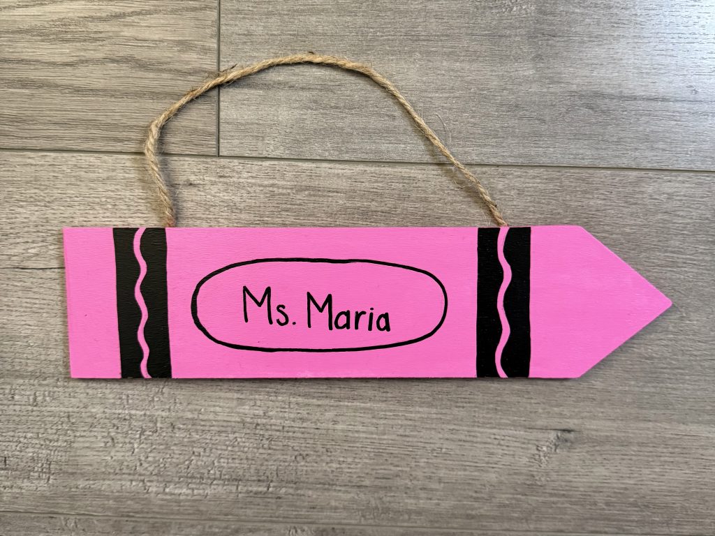 pink painted crayon name sign