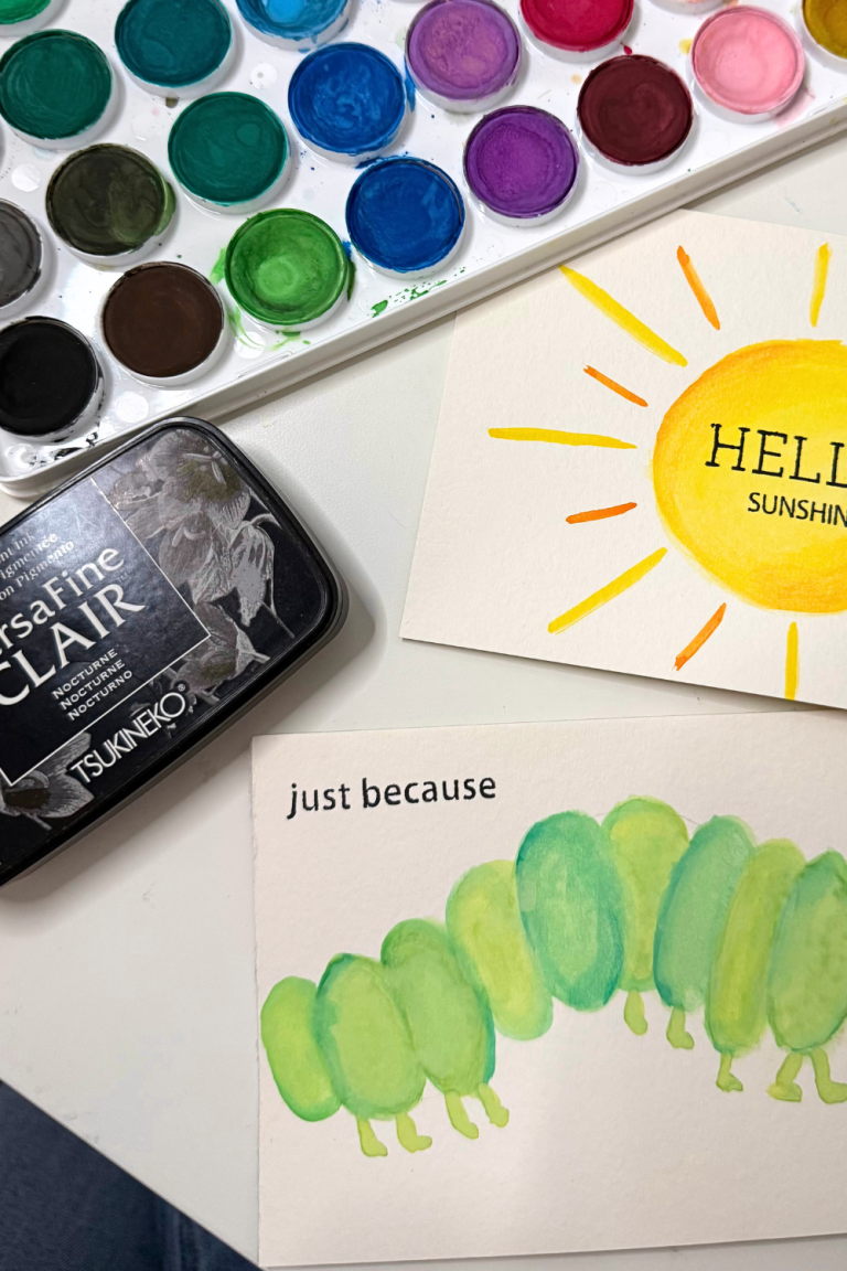 watercolor paint palette with ink pad and watercolor postcards