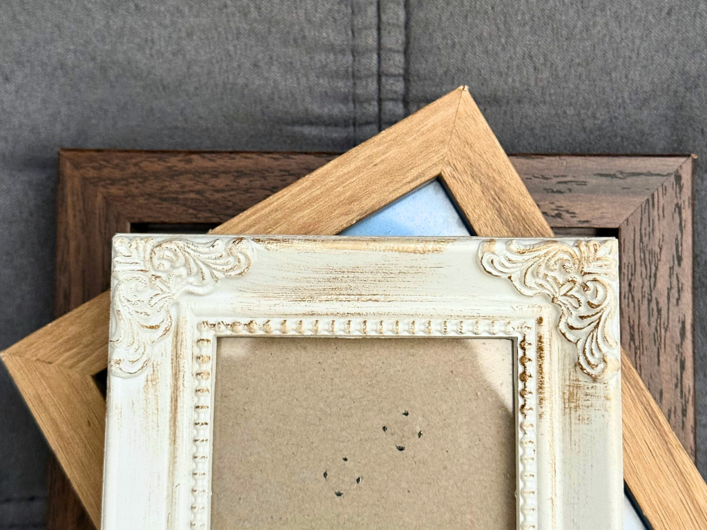 three picture frames stacked on top of each other