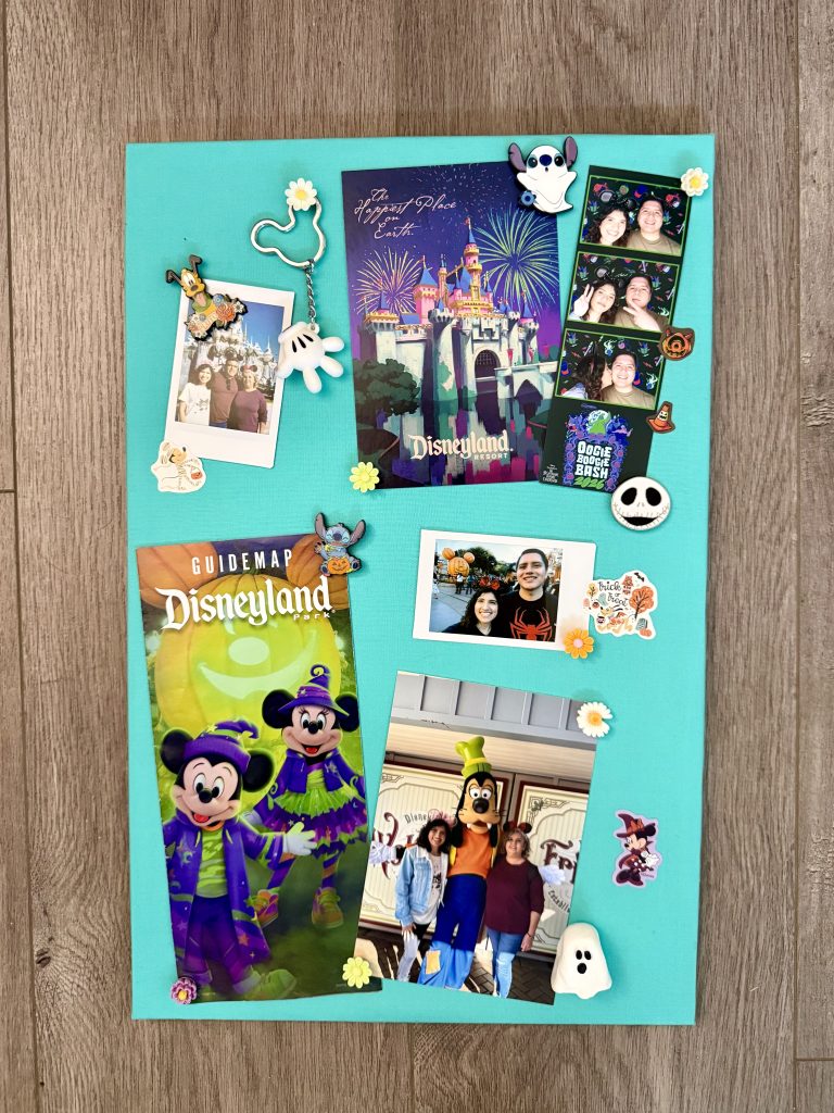 teal bulletin board with photos